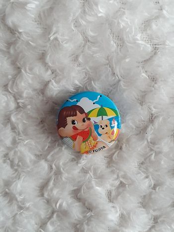 Petit badge peko chan fujiya