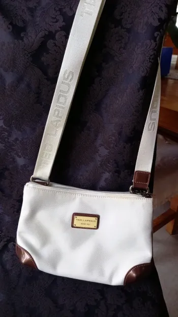 Pochette Ted Lapidus