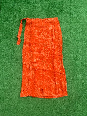 Jupe portefeuille longue orange motifs feuillage L 40 100% viscose Made in France