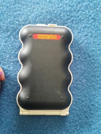 Jeu de poche Mancala vintage