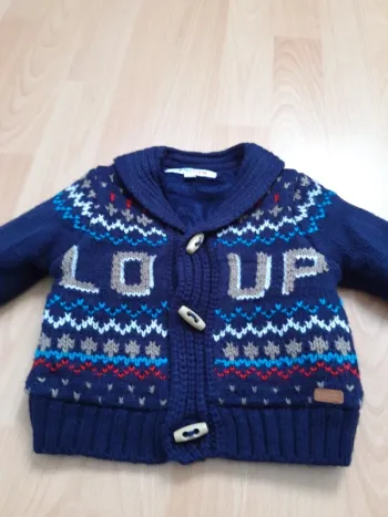 Très jolie veste en maille doublée polaire