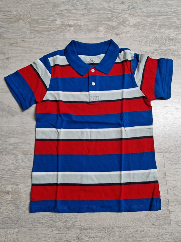 Polo Tex rayé 9-10 ans neuf