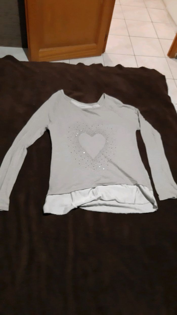 Pull taille M