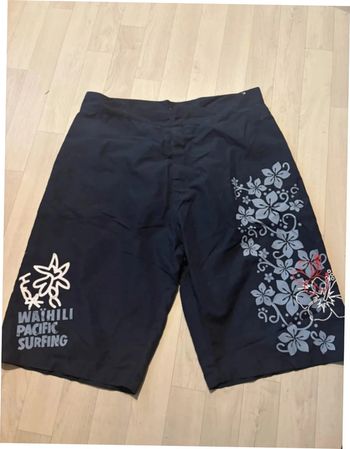 Short motif fleur de plage bleu marine XL très bon état