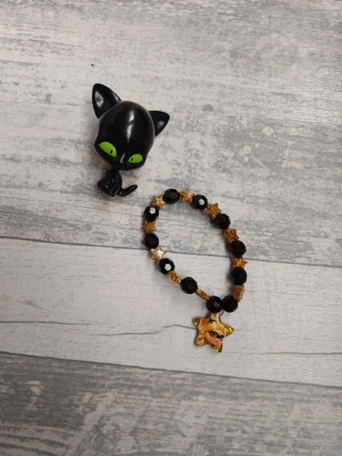 Figurine lady bug et bracelet