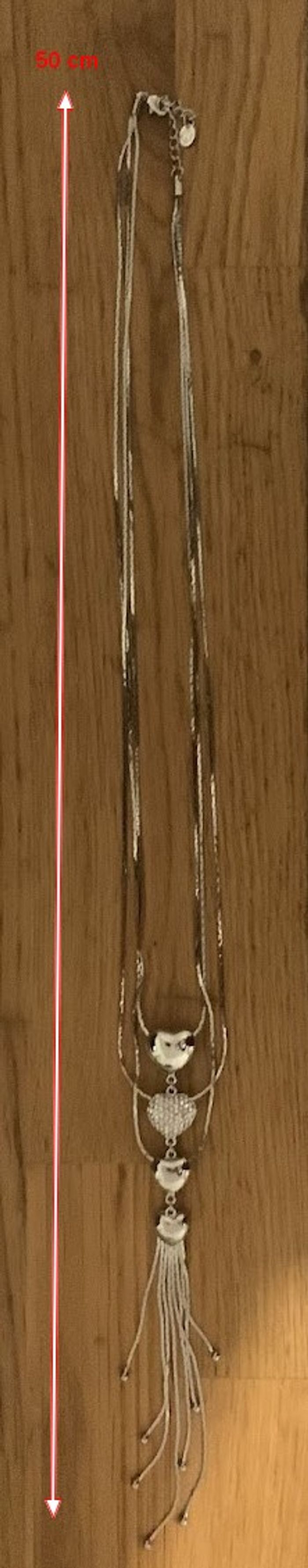 Collier long couleur argent avec 4 cœurs - photo numéro 2
