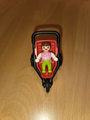 Bébé en poussette Playmobil
