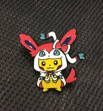 Pin’s Pikachu poncho Nymphali Pokémon broche en  très bon état