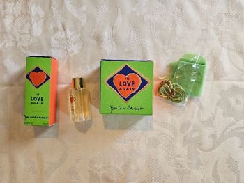 Lot miniature et pendentif In Love Again Yves Saint Laurent