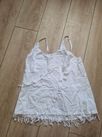 Débardeur neuf taille 3