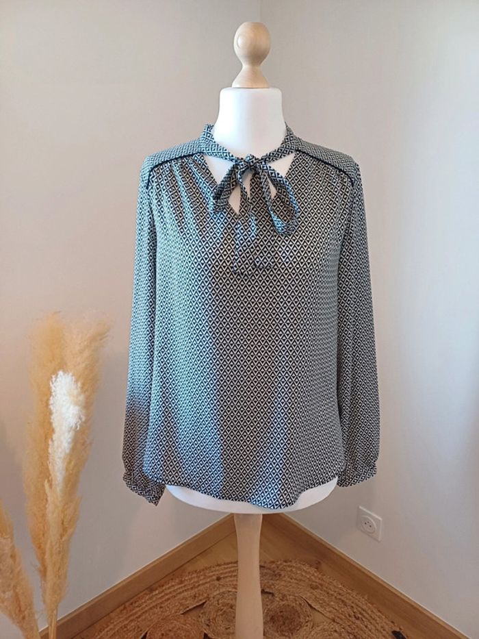 Blouse noire et blanche à motifs Kiabi taille L 40