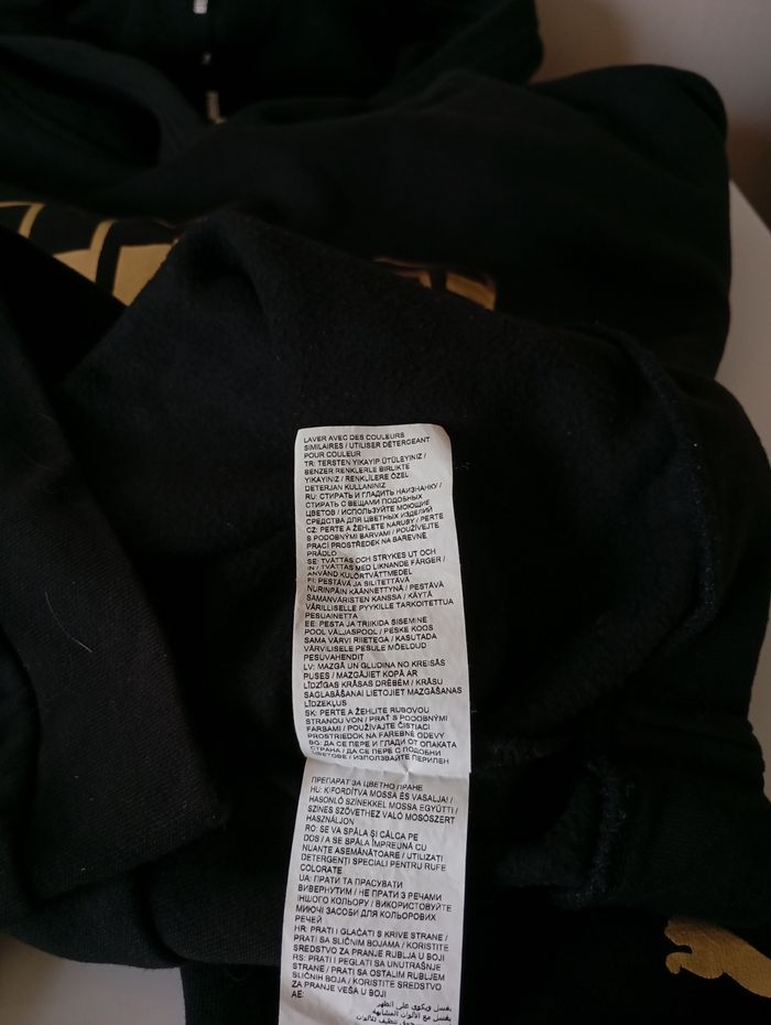 Sweat à capuche. Taille L. Noir et or . Coton et polyester . État neuf - photo numéro 8