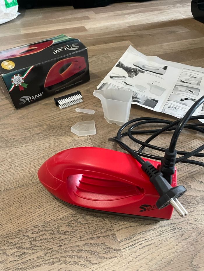 Fer a repasser à vapeur de voyage très bon état