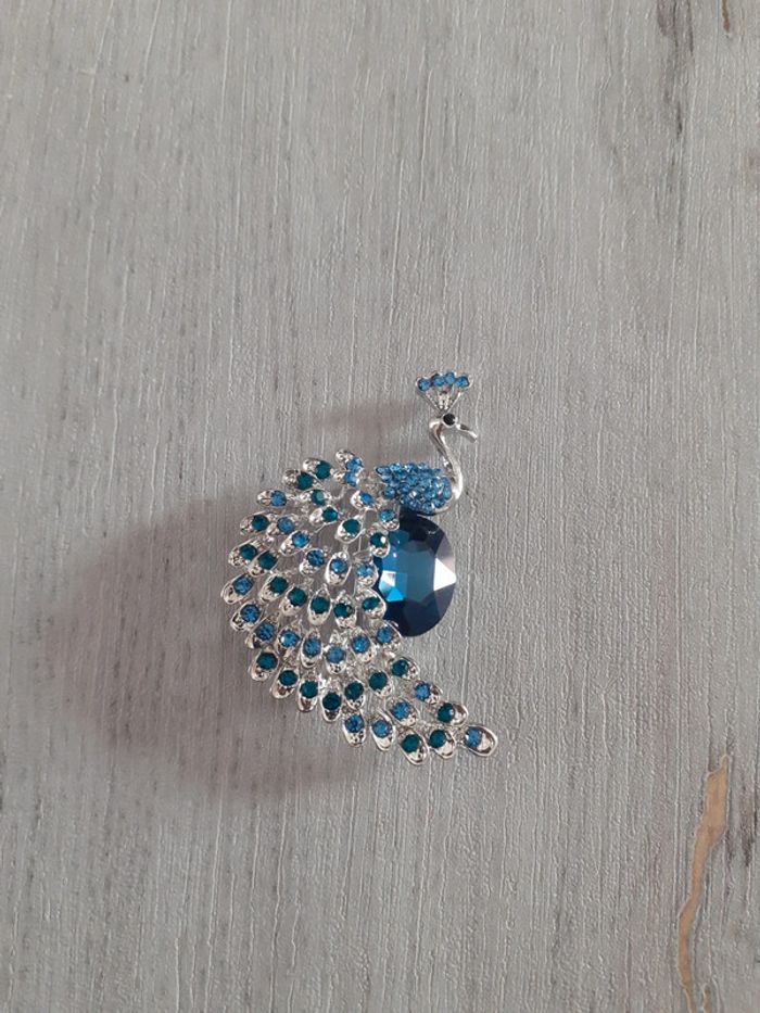 Broche paon