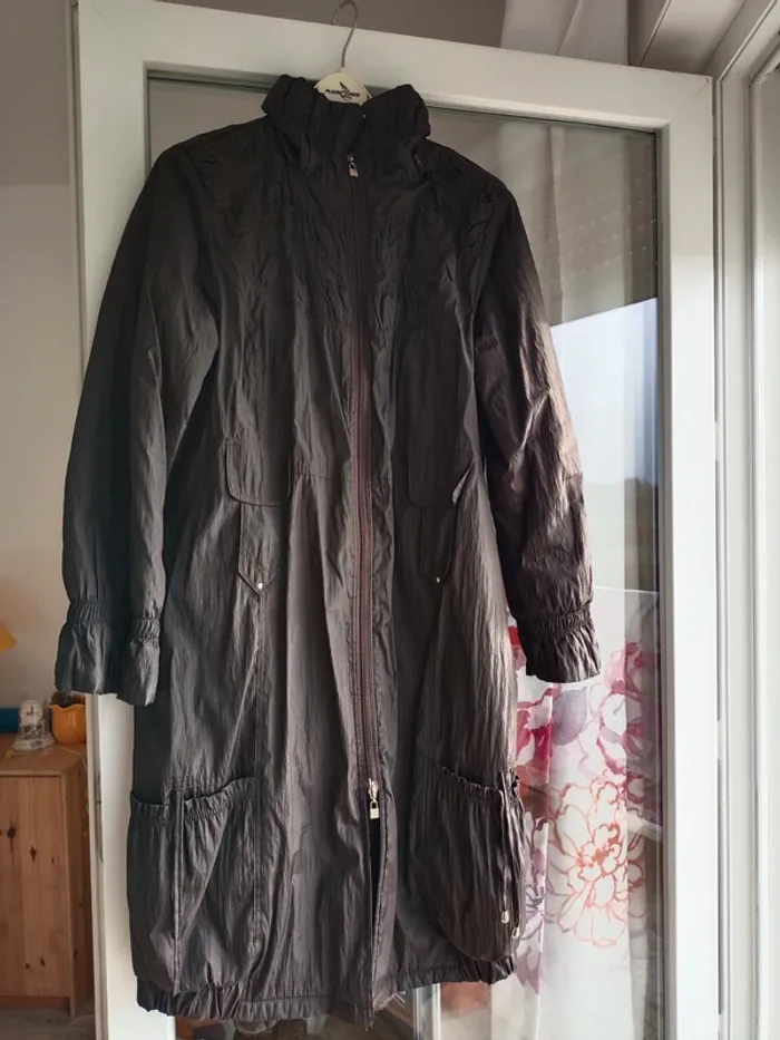 Manteau marron, taille 42
très bon état , - photo numéro 2
