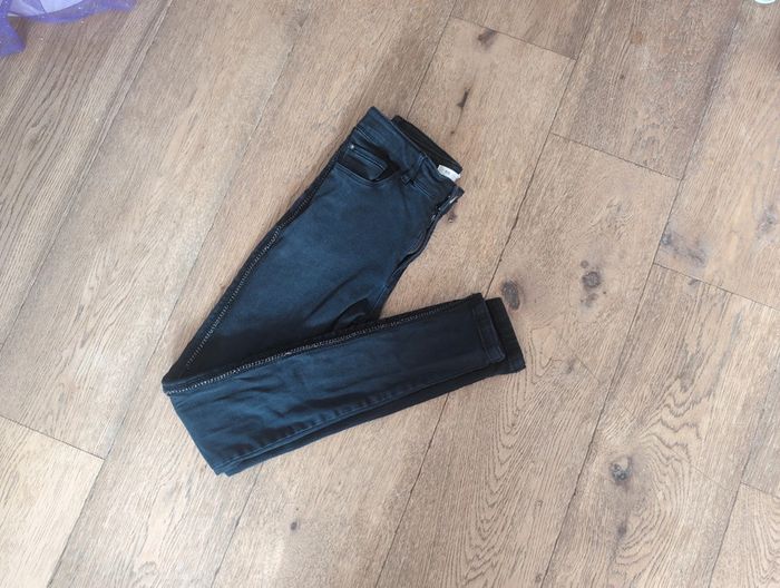 Jean skinny noir taille haute 14 ans détail chaine