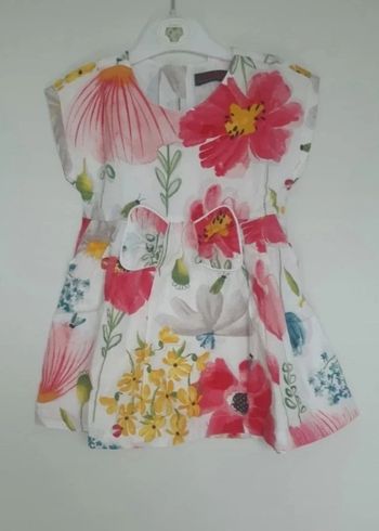 Robe florale sans manche forme trapèze noeud sur le milieu 2 ans catimini.