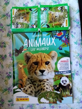 Lot Panini Le monde des animaux Les records- Un album vide et 49 pochettes scellées