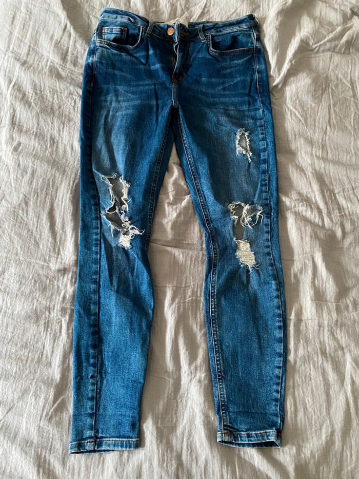 jean troué taille 38