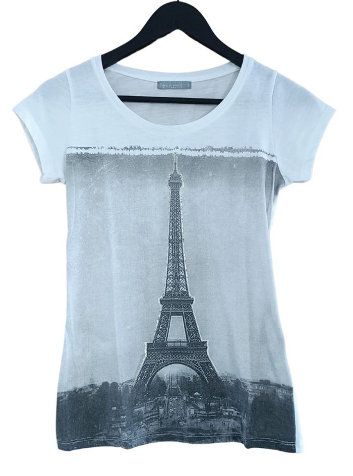 T shirt blanc casse imprime tour eiffel. Ligne a suivre. Taille S / 36