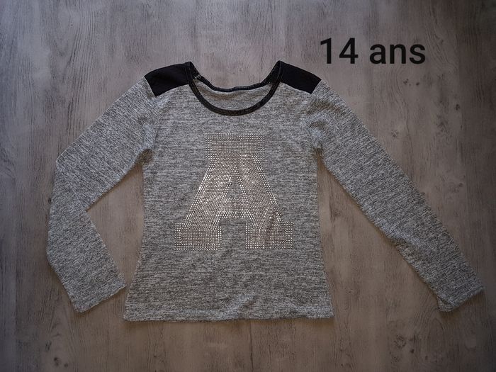 Pull 14ans