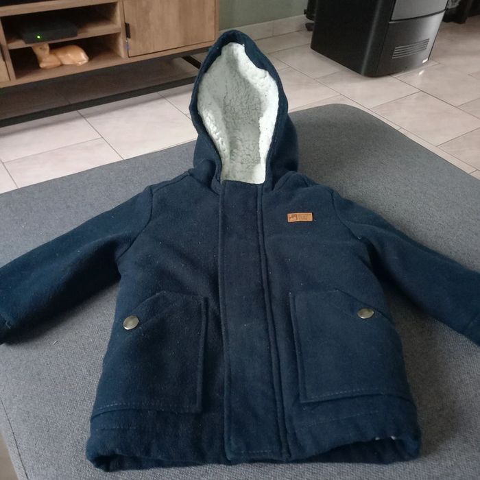 Manteau fourré et chaud a capuche