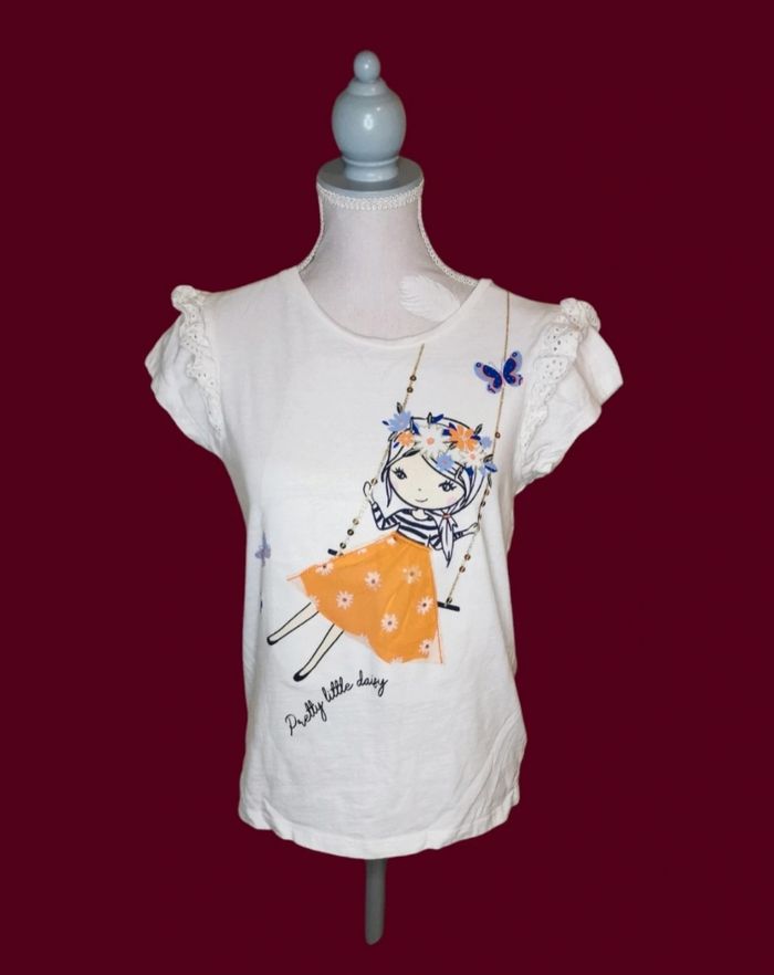 T shirt blanc manches froufrous dentellées motif fille balançoire avec tulle C&A taille 10 ans