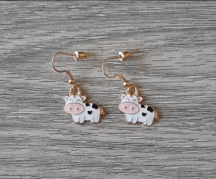 a vendre boucles d'oreilles.neuves emballees