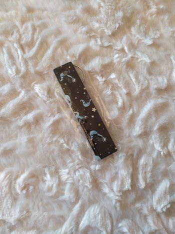 Strap porte-clés moufette neuf