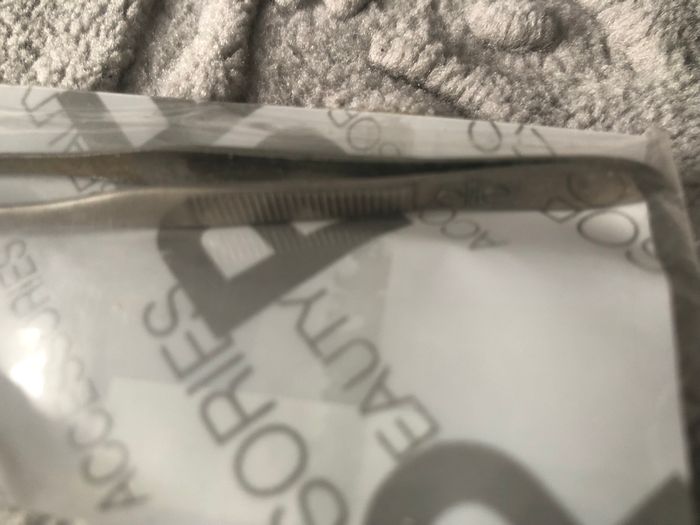 Pince à épiler neuf - photo numéro 2
