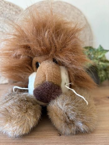 Vintage peluche lion marron couche Aurora