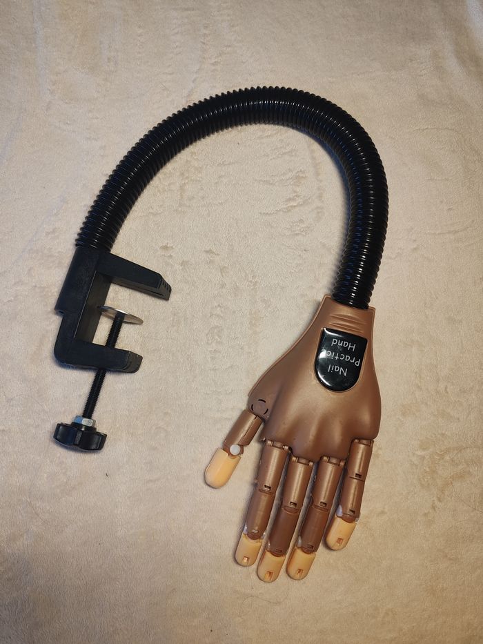 Main d'entraînement articulé