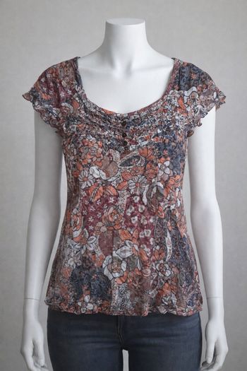 HAUT MARQUE PATRICE BREAL