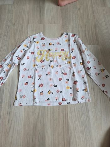 Polo manches longues fleurs taille 5 ans primark