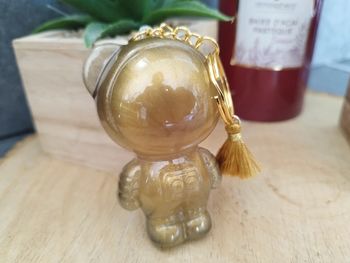 Porte clé ours espace or