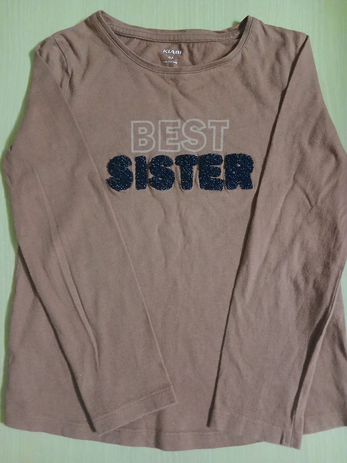 Pull fille en coton taille 6 ans marque kiabi couleur rose fonce tres bonne etat