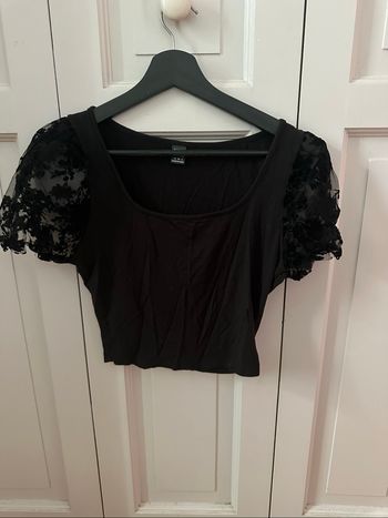 Haut court noir manches ballons floqué velours
