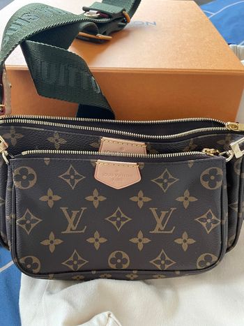 Sac multipochettes LV