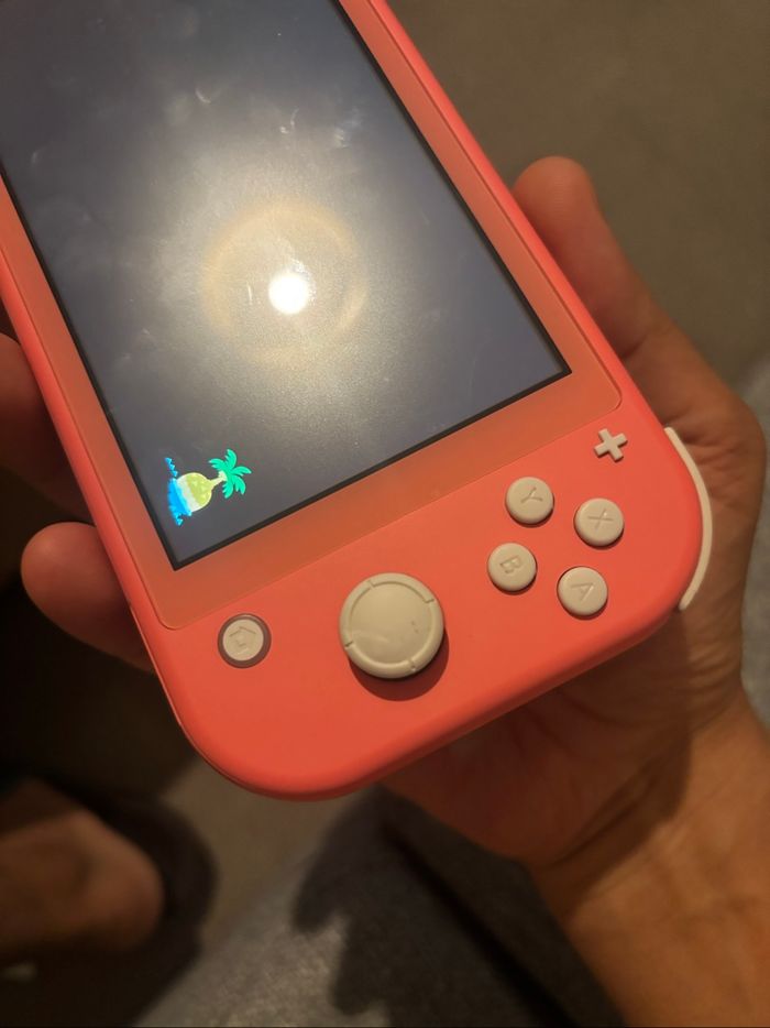 Nintendo switch lite corail - photo numéro 5