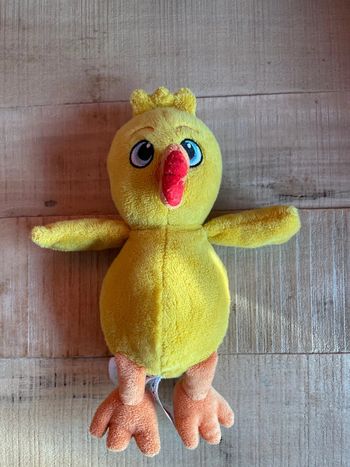 Kinder peluche poussin