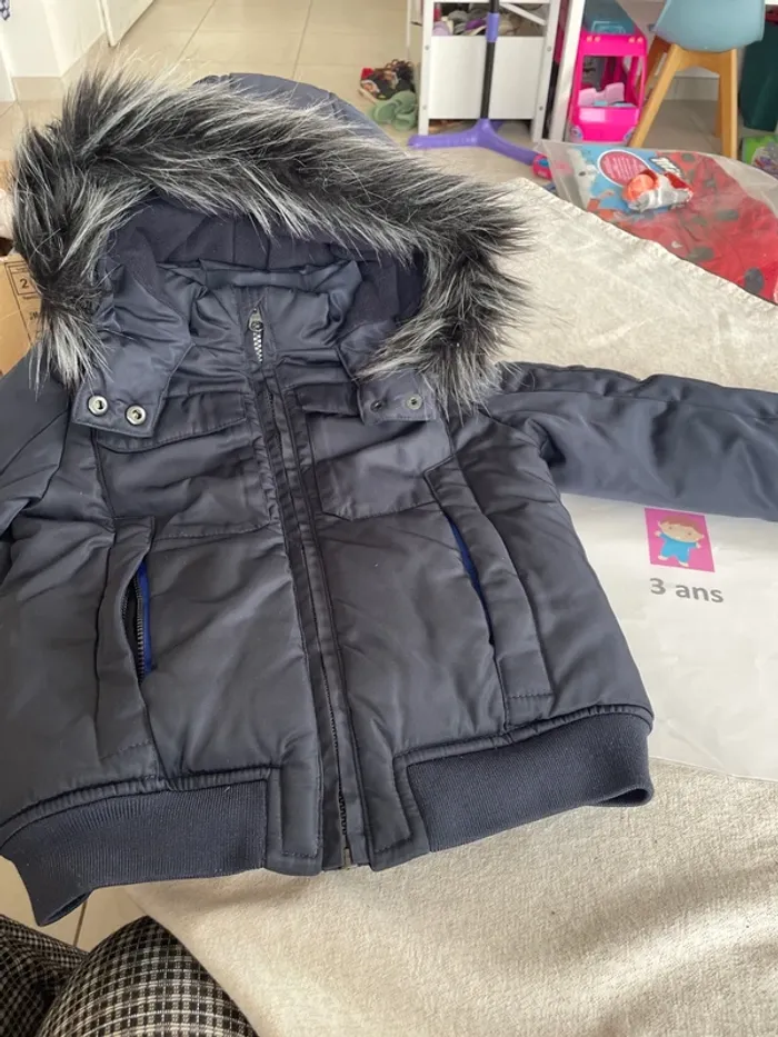 Manteau catimini, trois ans