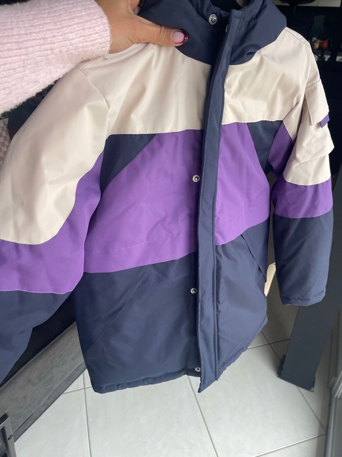 Manteau imperméable neuf 8 ans