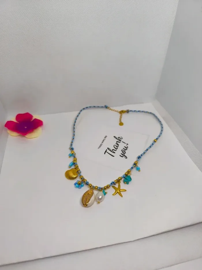 Collier doré et turquoise avec charms marins et fleur - photo numéro 6