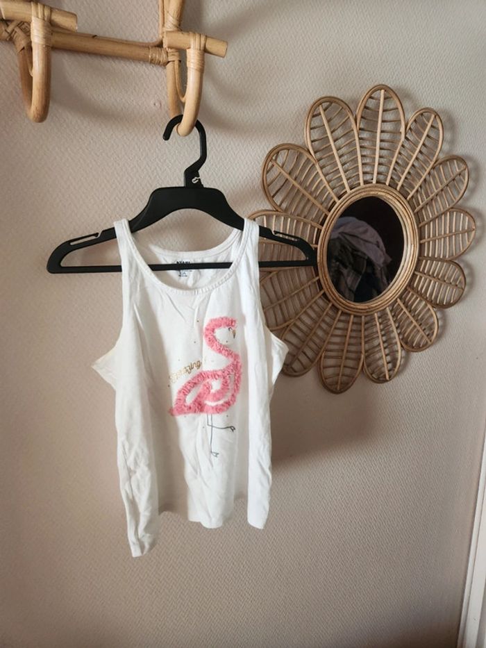 Debardeur blanc flamant rose 3D kiabi 10ans