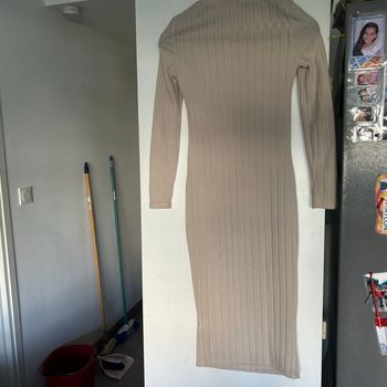 Robe moulante col roulé