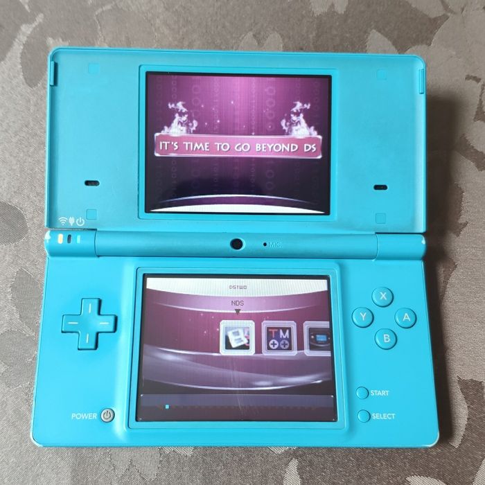 Nintendo DSi bleu avec 10 000 jeux - photo numéro 5
