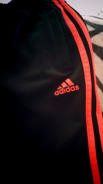 Jooging noir et orange "Adidas" 9/10 ans mixte neuf