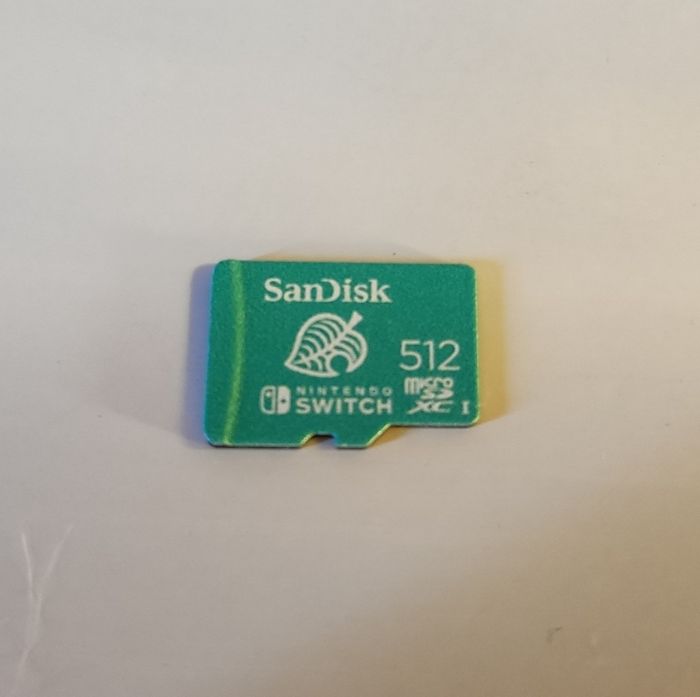 Console Nintendo Switch OLED Blanc 64Go + 2 Jeux + Sacoche + Carte Micro SD - photo numéro 10