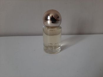 Miniature de parfum.  Eau de Courrèges