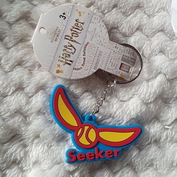 Porte clé harry Potter vif d'or